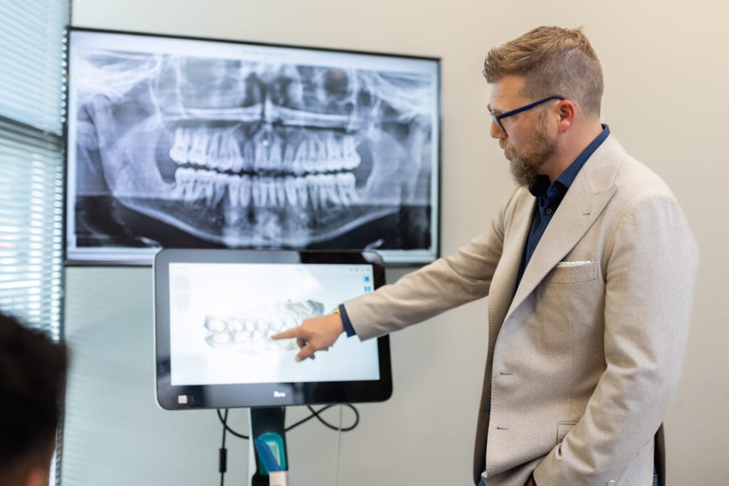 Dr. Gladwell Showing Imaging