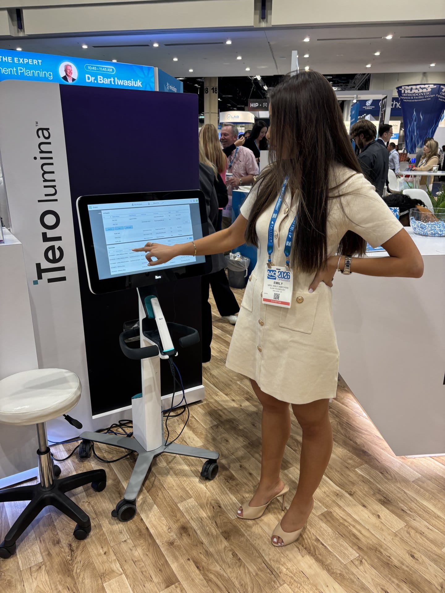 Emily Abecasis demonstrating iTero Lumina at the Align booth during AAO 2026