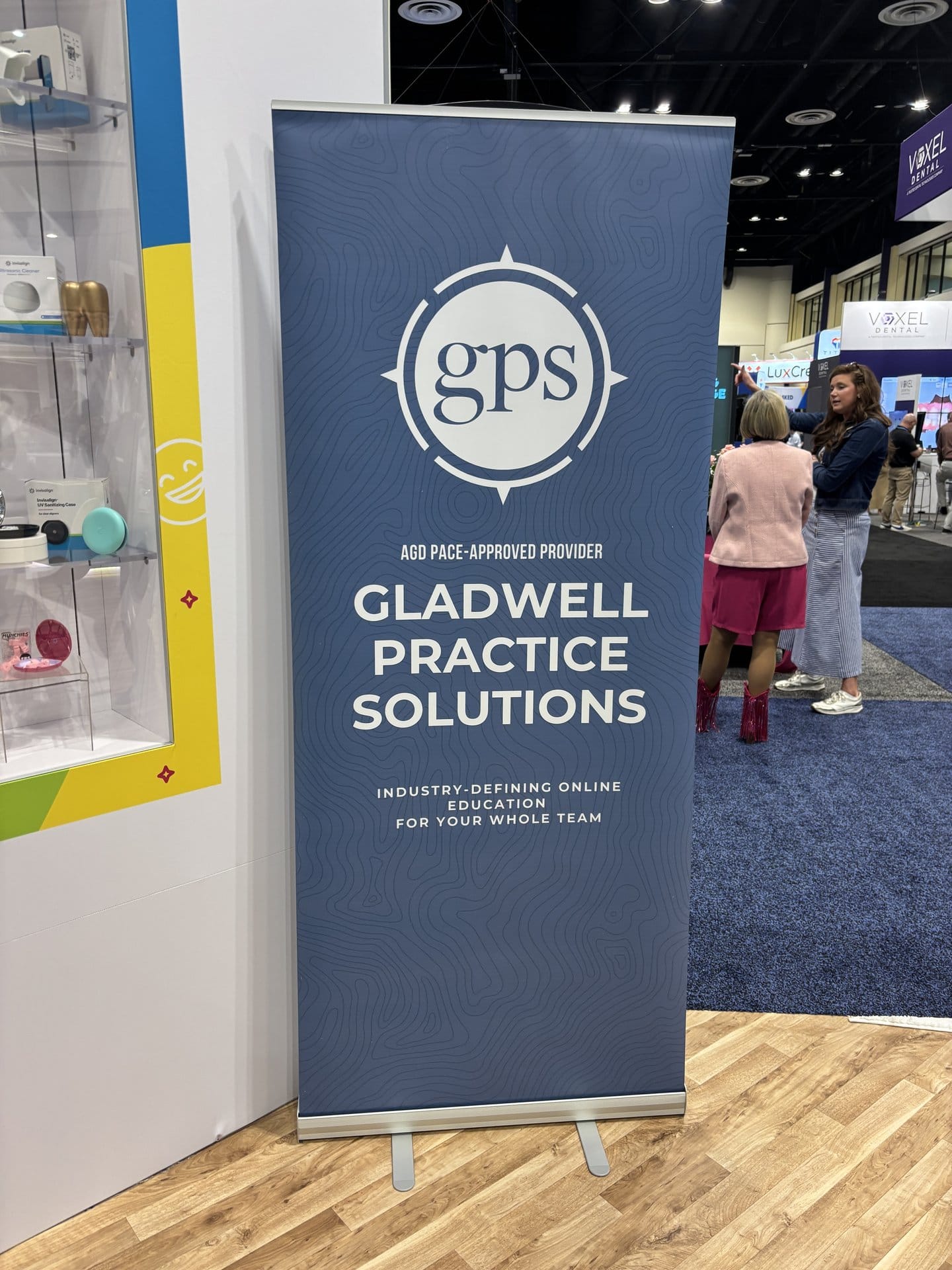 Gladwell Practice Solutions branded booth banner at AAO 2026