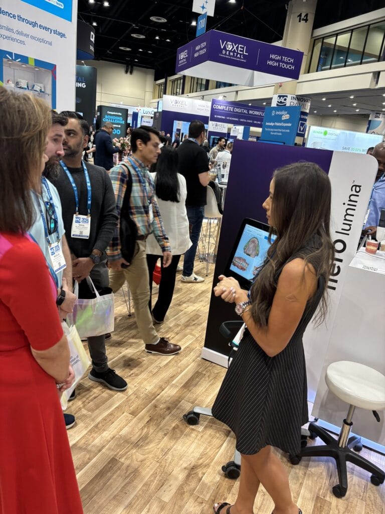 Emily Abecasis guest speaking at the iTero booth at AAO 2026