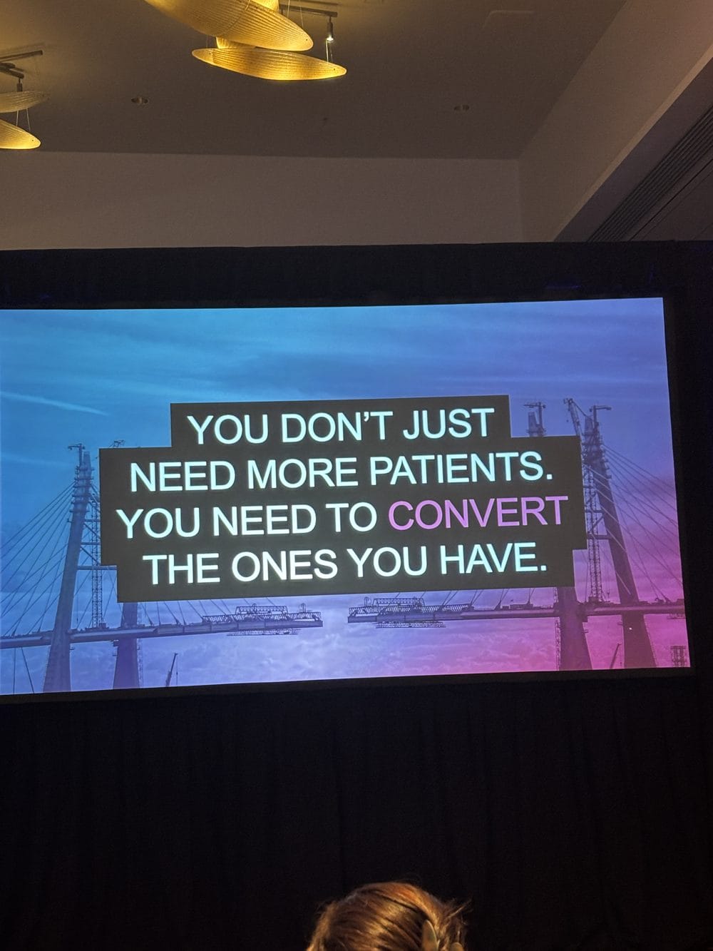 Beyond Possible: What We Took Away from the 2026 Invisalign Ortho Summit 2 Session slide: You don't just need more patients. You need to convert the ones you have.